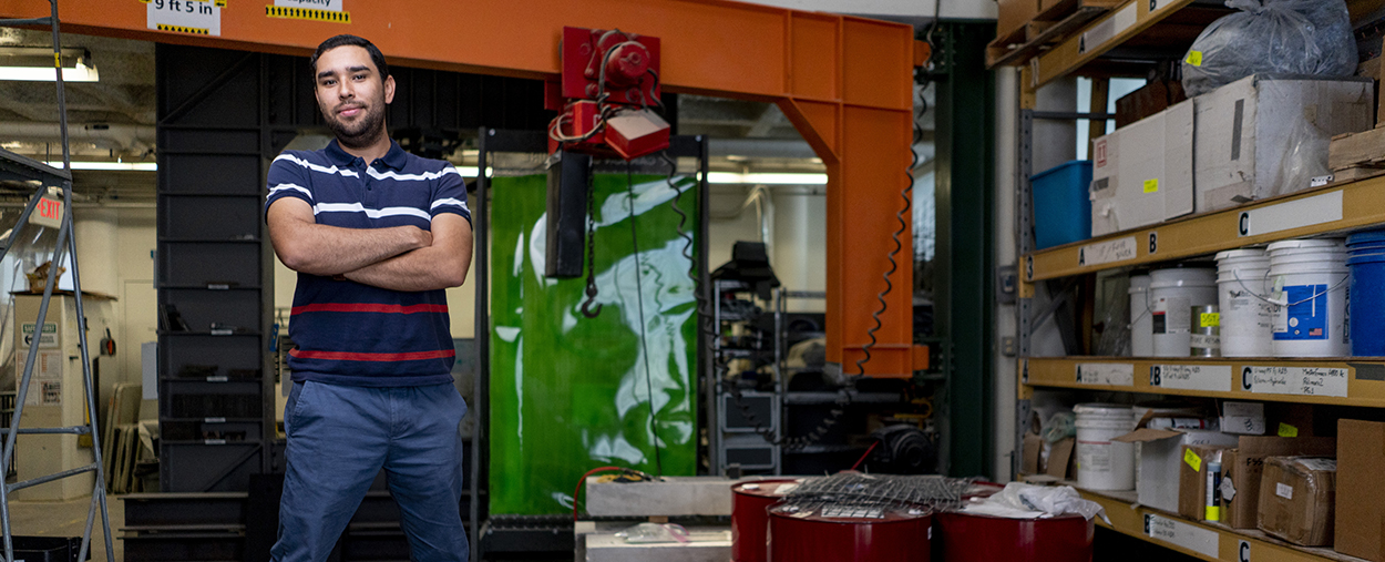 Student posing in a lab