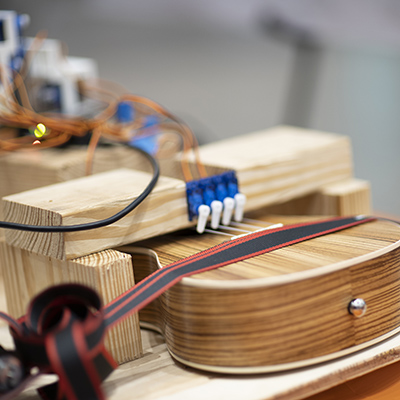 Robot guitar at the senior design expo