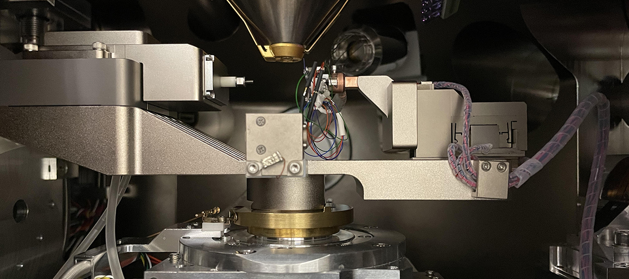 Setup showing the Bruker PI-88 in-situ SEM picoindenter. The picoindenter is used to test materials at the nanoscale within a SEM microscope. Loading and SEM imaging are synchronized during experiments to allow the investigation of the fundamental mechanisms of deformation and fracture. The picoindenter operates up to 800C.