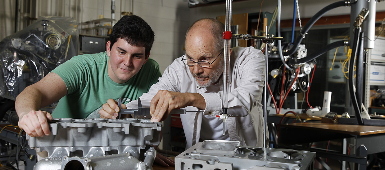 professor and student work in a lab