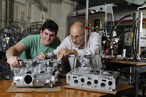 professor and student work in a lab